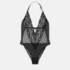 Broderet bodysuit med blondekant