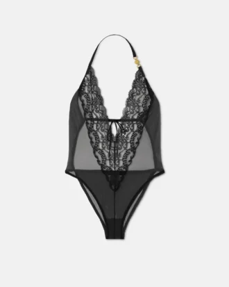 Broderet bodysuit med blondekant