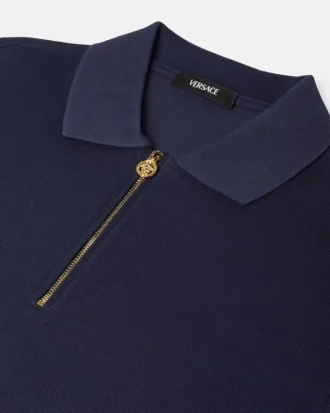 Broderet polo i bomulds-piqué med halv lynlås