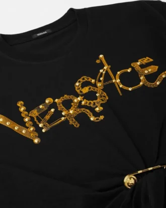 Crop-T-shirt med sikkerhedsnål og nitter