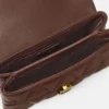 Kleio quiltet nappa mini-taske