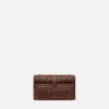 Kleio quiltet nappa mini-taske