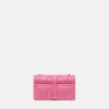 Kleio quiltet nappa mini-taske
