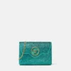 La Medusa-pyntet satin-clutch