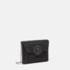 La Medusa-pyntet satin-clutch