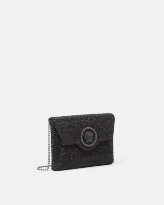La Medusa-pyntet satin-clutch