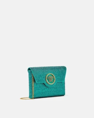 La Medusa-pyntet satin-clutch