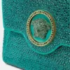La Medusa-pyntet satin-clutch