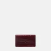 Medusa 95 Clutch med krokodilleeffekt Medusa 95 Clutch med krokodilleeffekt