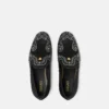 Medusa-pyntede satinslippers