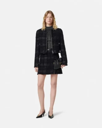Ribstrikket top i lurex-blanding