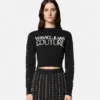 Sweater med pyntet logo